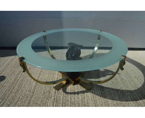 A mid-Century modern brass framed glass top coffee table, with fish-scale designed to contain a large resin abstract sculptur