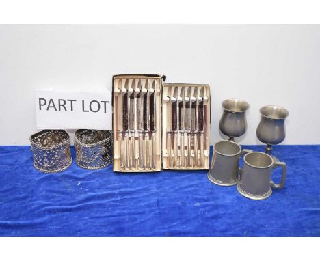 A pair of Victorian Sheffield plated wine bottle coasters and a quantity of pewter tankards and goblets, together with a set 