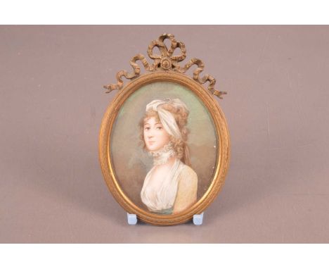 A late Georgian ivory portrait miniature, oval, 8.5cm by 6.5cm, marked to rear: Lucy Roberts of Leinster, depicting a lady in