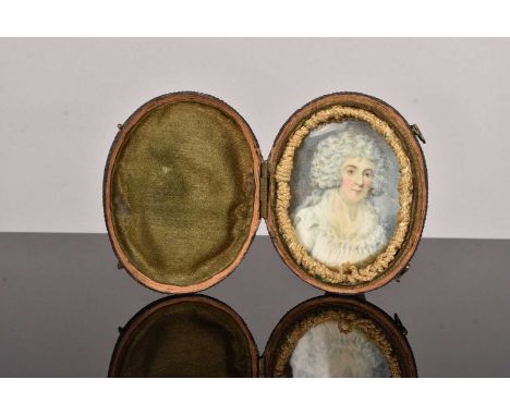 A 19th Century oval Portrait Miniature of a Lady, hand painted on an ivory panel, within a shagreen fitted case, sold with Iv