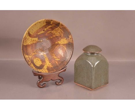 St Ives studio pottery lidded caddy, 16.5cm high together with a studio pottery bowl, 7.5cm high with wooden stand (3)Please 