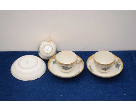Three Meissen porcelain cabinet cups and saucers