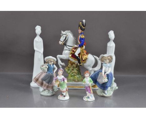 Seven mixed porcelain figures, including Schiebe Alsbach "Dorsenne" Napoleonic rider on horseback,30cm high, Pauline Shone Sp