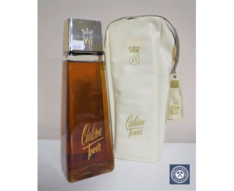 Carleton Tower Rare Old Canadian Whisky, vintage 1957, 25oz, sealed cap with label, in carry bag  CONDITION REPORT: We were u