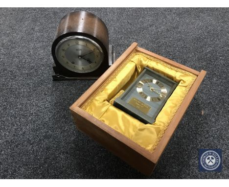 An oak cased Garrard mantel clock together with a slate battery operated presentation clock in a fitted wooden box