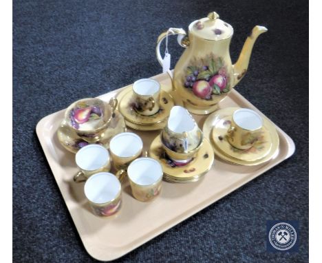 A tray of nineteen pieces of Aynsley Gold Orchard tea china  CONDITION REPORT: Small crack to inner rim of teapot, appears to