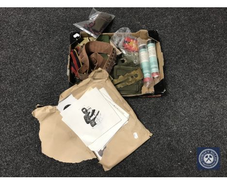 A box of military clothing, ammunition belt, brass button polisher, hand flares, wallet of targets etc 