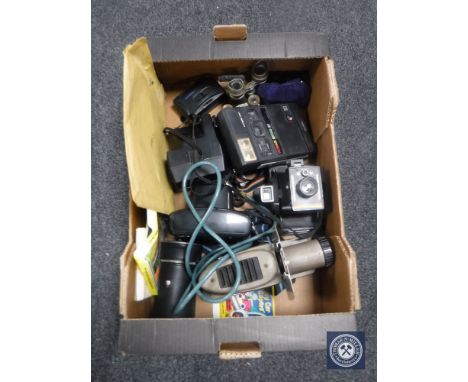 A box of opera glasses, field glasses, assorted camera, projector etc 