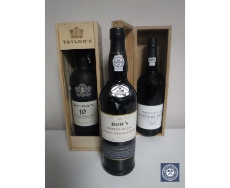 Taylor's 10 Year Old Tawny Port 75cl and Vintage Port 1985 75cl, both in presentation cases, together with Dow's Finest Reser