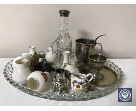 A glass trinket tray of Goss pieces, Wade whimsies, plated ware etc and a miniature bulbous silver vase, height 5 cm 
