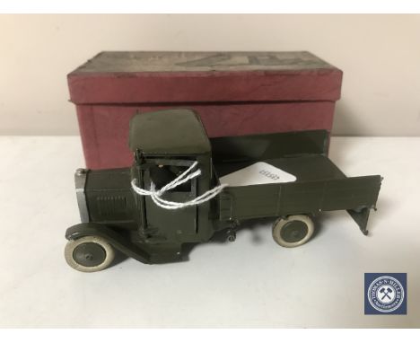 A boxed vintage W. Britain army lorry with driver 