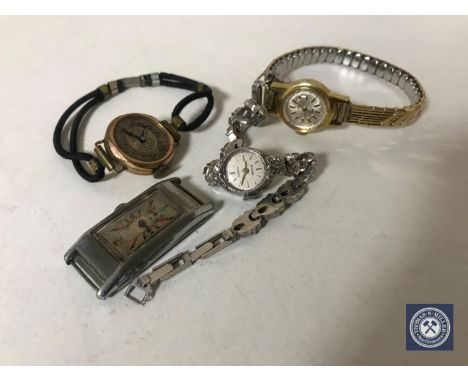 A box of four vintage watches, lady's gold wrist watch, Art Deco watch etc 