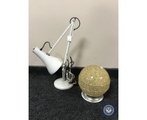 A mid 20th century circular light shade together with an angle poise lamp