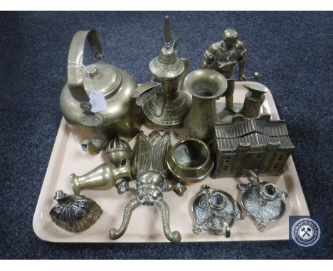 A tray of assorted brass ware, figure of a blacksmith, brass kettles, vases, candlestick holder etc 