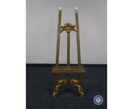 A gilt easel 