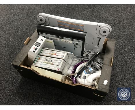 A box containing Nintendo Wii console with accessories and games together with a Sky plus HD box