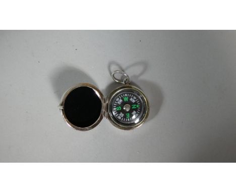 A Silver Cased Miniature Compass 