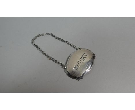 A Silver Whisky Decanter Label 
