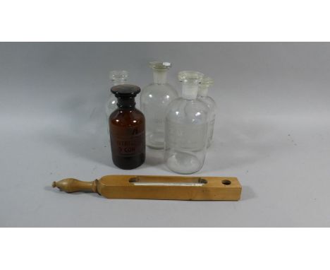 A Collection of Five Glass Chemist Bottles with Etched Labels for Hydrochloric Acid, Nitric Acid, Sulphuric Acid etc Together