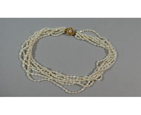 A Six String Baroque Pearl Necklace 