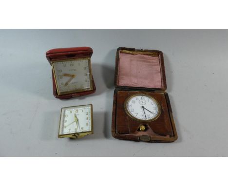 Two Travel Alarm Clocks and a Vintage Crocodile Cased Clock 