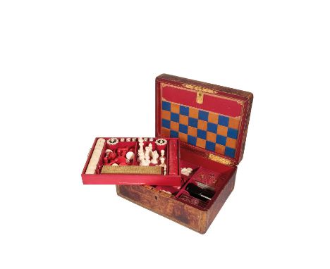 SCOTTISH GAMES COMPENDIUM, 19th century, the tooled gilt leather case with gilt metal handle, with red-stained and natural bo