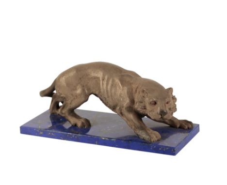 RUSSIAN SILVERED METAL AND LAPIS LAZULI MODEL OF A TIGER, 20TH CENTURY, realistically cast with ruby eyes, raised on a rectan