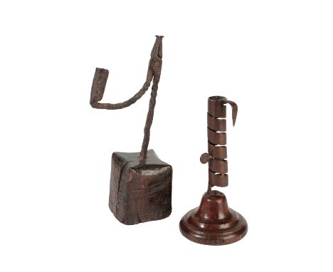 18TH CENTURY CAST IRON RUSH LIGHT, on a square oak block base, 27cm high; together with a STEEL 'SPIRAL' ADJUSTABLE CANDLESTI