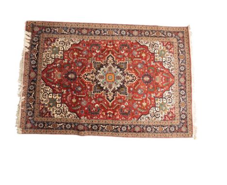 LARGE "COUNTRY HOUSE" CARPET of Isfahan pattern with navy border and multi-coloured ground, 20th century, 200cm x 294cm