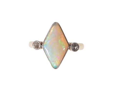 OPAL AND DIAMOND RING, the diamond shaped opal, flanked either side with a brilliant-cut diamond, each approx 0.05ct, set in 