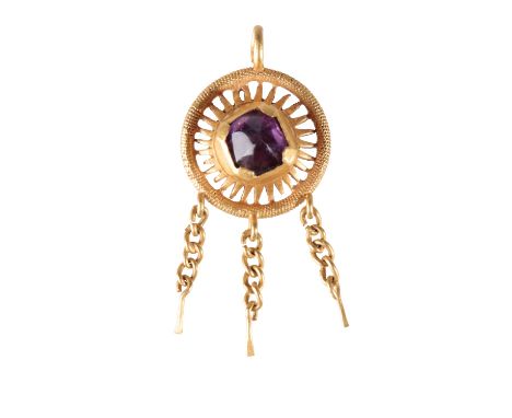 MEDIEVAL GOLD HAT JEWEL with a faceted amethyst in a pierced yellow gold mount emblematic of the sun in splendour (the person