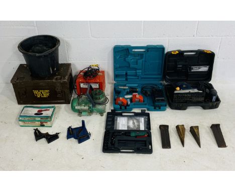 A collection of various tools including a cased MacAllister 1/2 sheet orbital sander, cased Makita cordless percussion-driver