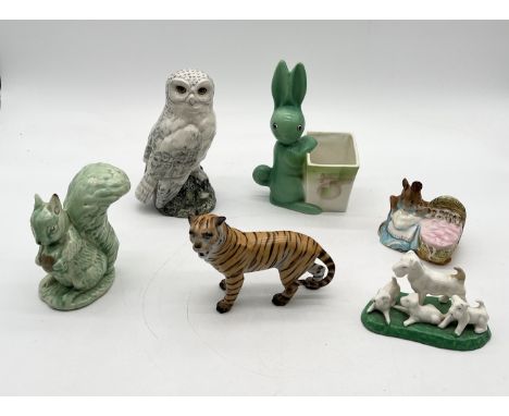 A collection of ceramics including Beswick Beatrix Potter Hunca Munca, Sylvac squirrel, Goebel rabbit (A/F), Tiger etc.