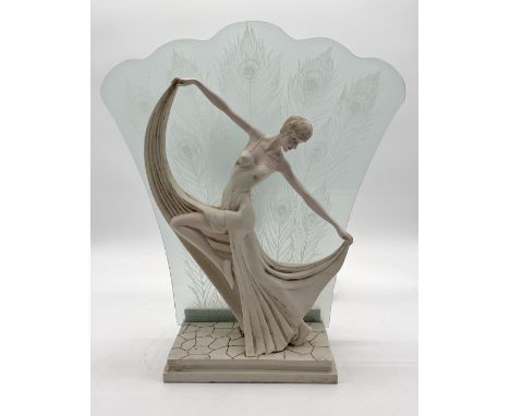 An Academy Art Deco style lamp with frosted glass panel decorated in peacock feather pattern
