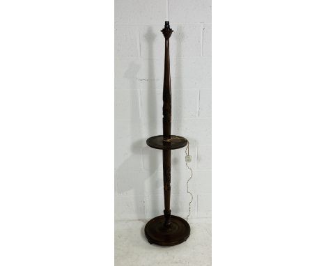 A vintage camphorwood standard lamp with oriental carved scene decoration, 102cm high.