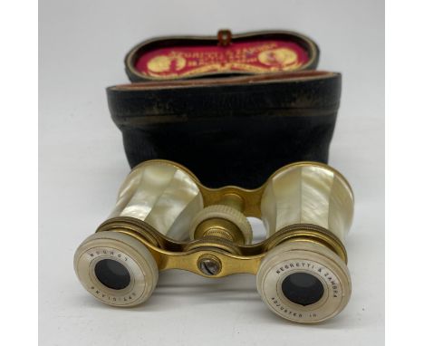 A pair of Negretti & Zambra mother of pearl opera glasses in original silk lined leather case- winder seems stuck