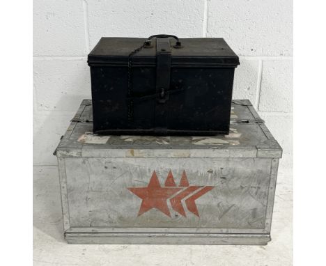 A vintage metal steamer trunk, possibly Russian, along with an antique cast metal storage box 