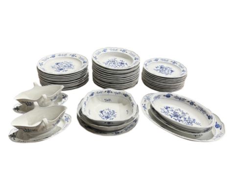 A Meissen large part service decorated to the centre with flowers and foliage and further sprays of flowers to the rim. Compr