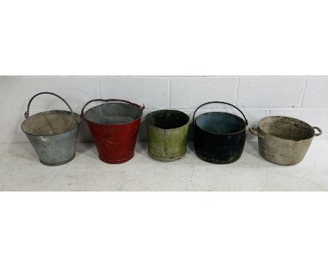 Two vintage galvanised buckets including a red fire bucket, along with a cauldron, galvanised bin etc