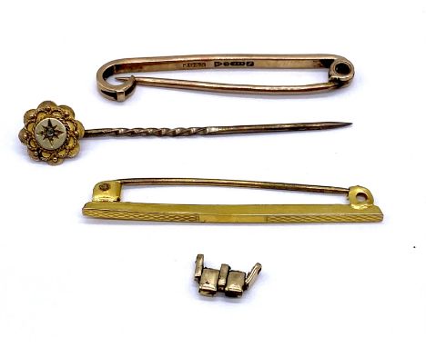 A 9ct gold stick pin set with a diamond along with a 9ct bar brooch (weight 2.8g) along with a 14ct gold bar brooch (pin not 