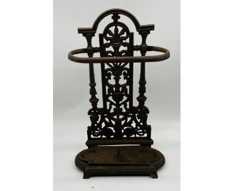 A Victorian cast iron stick stand - height 52cm
