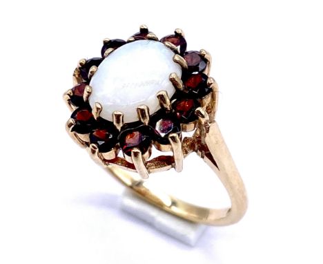 A 9ct gold opal and garnet cluster ring, size Q