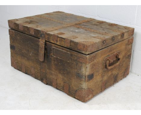 An antique metal bound wooden trunk, with wrought iron handles, named to 'Hubert Wight-Boycott Esq.' - length 98cm, depth 67c