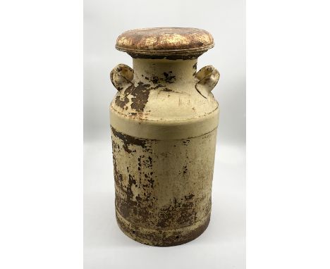 A vintage cream painted milk churn - height 62cm