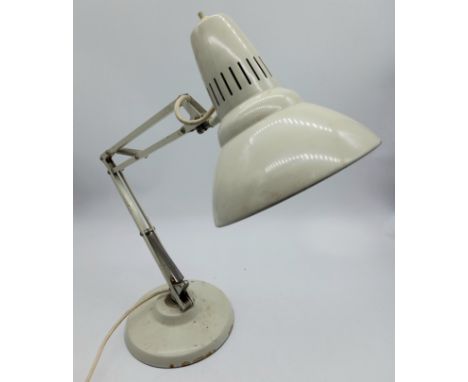 A vintage white Anglepoise lamp by 1001 Lamps Ltd. stamped Norway to one side
