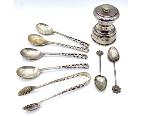 A collection of silver coffee spoons (weight 86g) along with a silver pepper grinder (A/F)