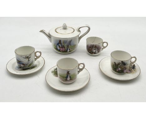 A Grimwades Beatrix Potter child's part tea service decorated with various scenes from Peter Rabbit - damage to some pieces