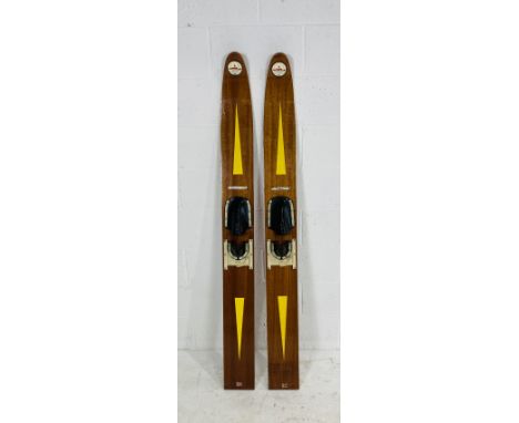 A pair of vintage Estuary Brand water skis