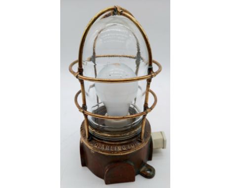 An Industrial brass bulkhead lamp by F H Lovell & Co Arlington N. J, 23cm high. 