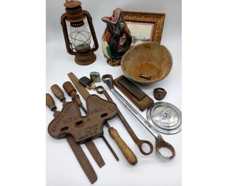 A collection of miscellaneous items to include an assortment of various tools, hip flask, lantern etc.